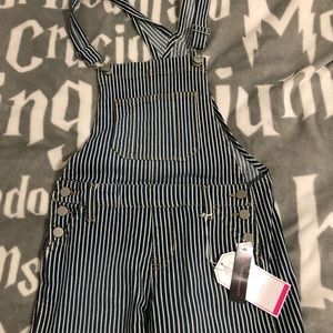 Blue and white striped overalls.